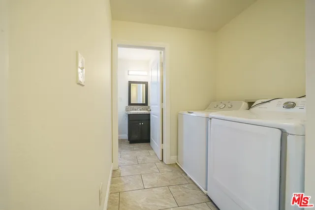 a utility room with a washer and dryer
