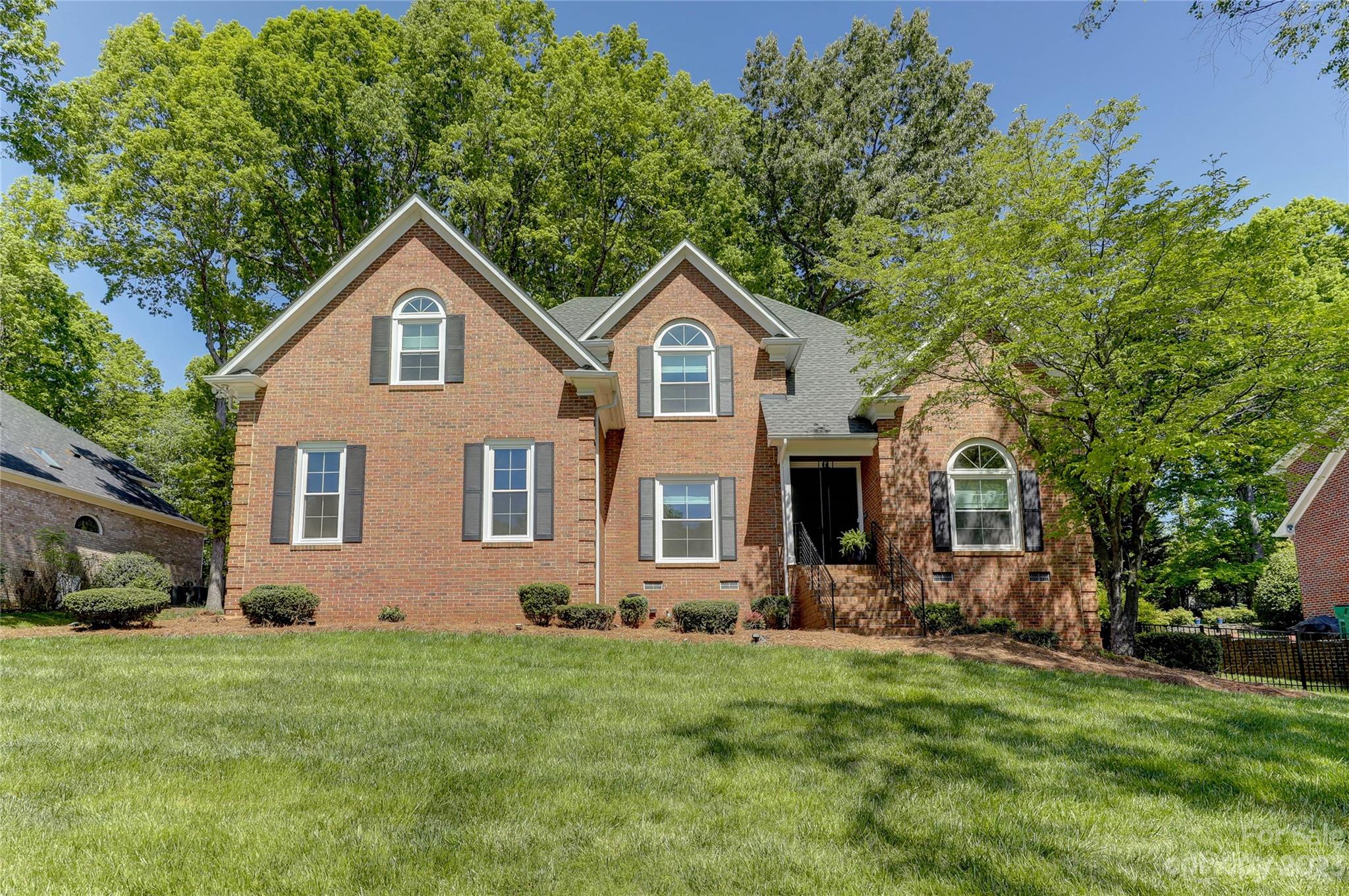 4308 Rosecliff Drive Charlotte, NC 28277 - Photo 1 of 39 a front view of house with yard and green space