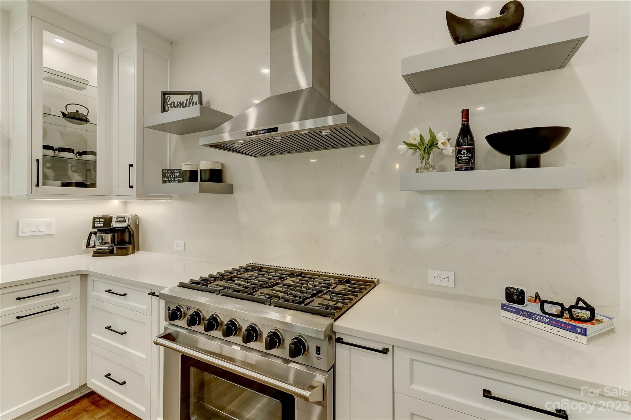 4308 Rosecliff Drive Charlotte, NC 28277 - Photo 13 of 39 a white stove top oven sitting inside of a kitchen