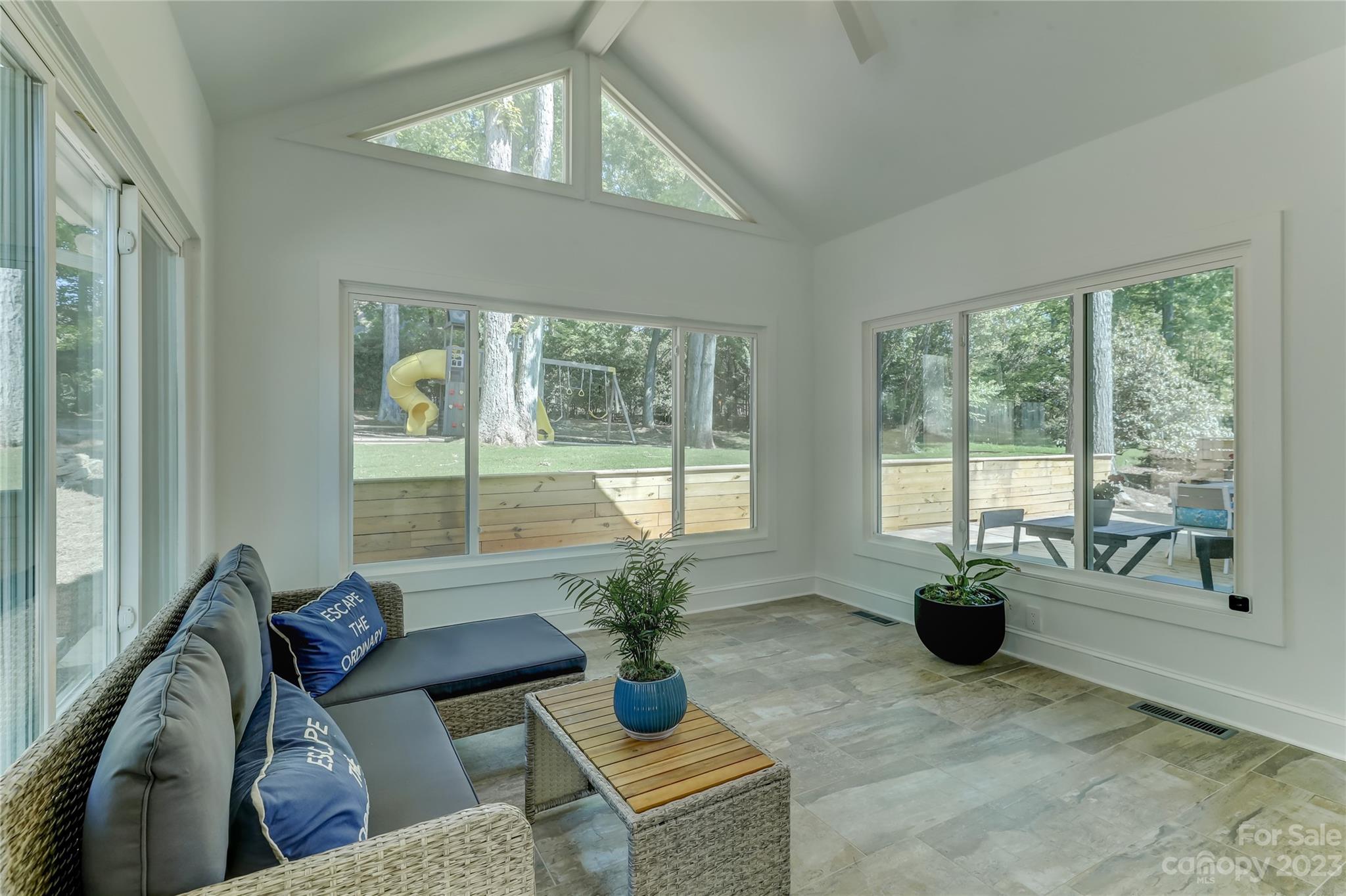 4308 Rosecliff Drive Charlotte, NC 28277 - Photo 18 of 39 a living room with furniture and large windows