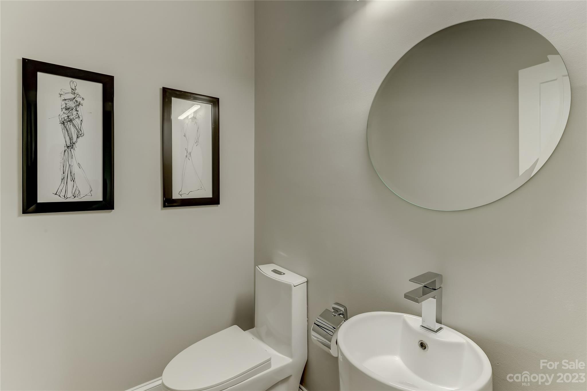 4308 Rosecliff Drive Charlotte, NC 28277 - Photo 21 of 39 a bathroom with a toilet and a sink