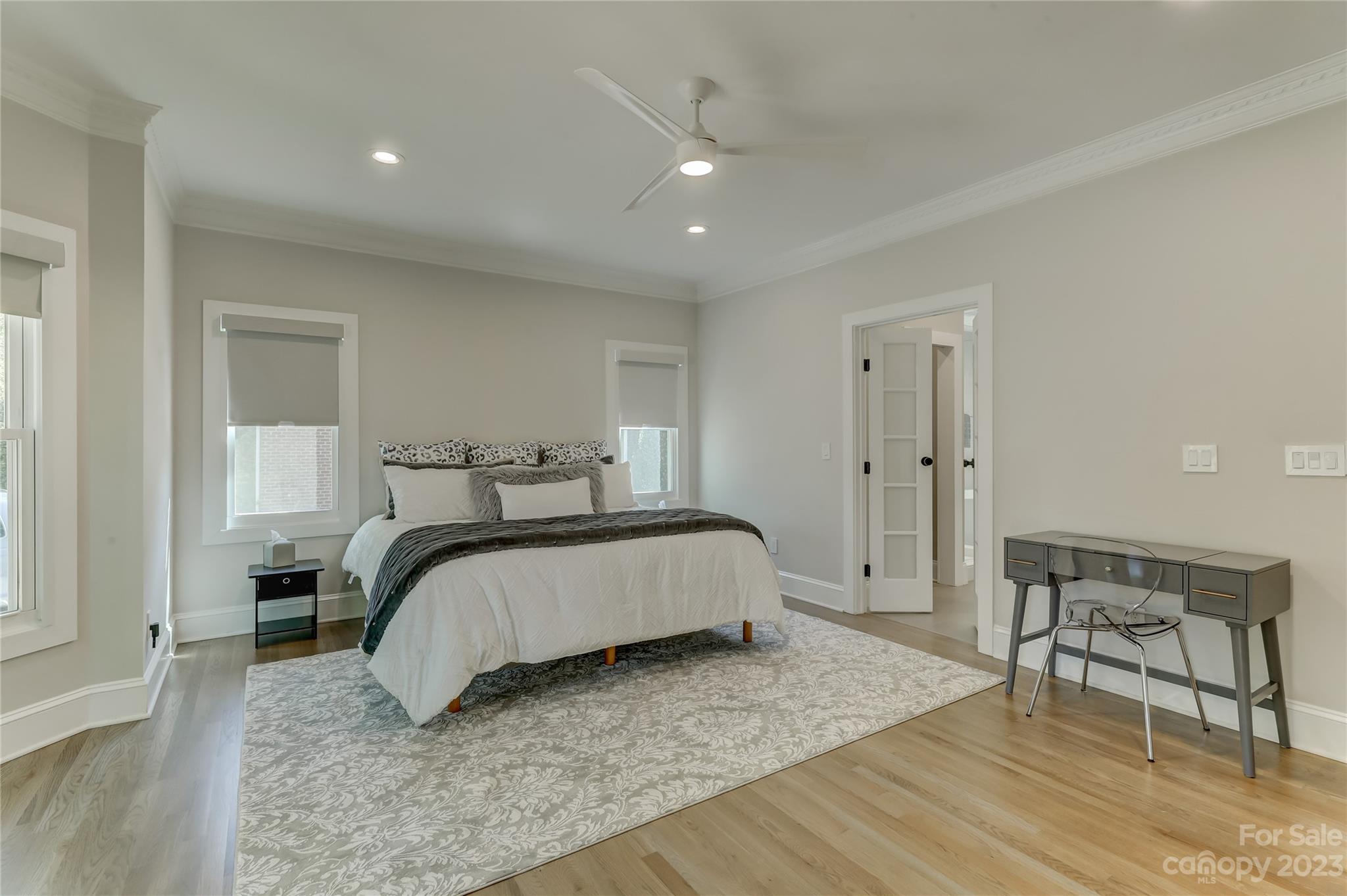 4308 Rosecliff Drive Charlotte, NC 28277 - Photo 23 of 39 a spacious bedroom with a bed and a table in it