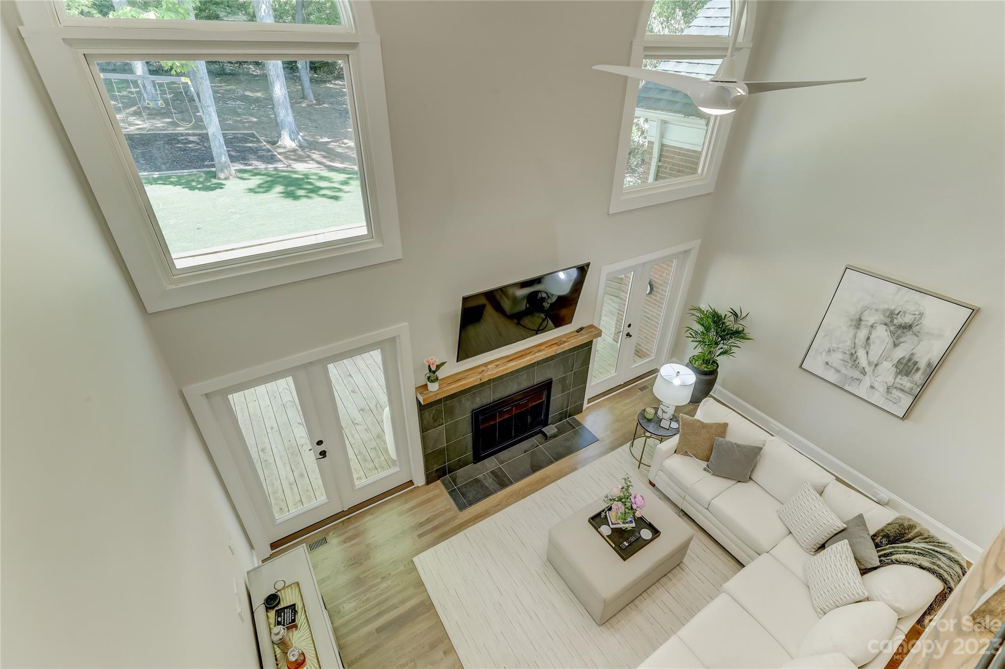 4308 Rosecliff Drive Charlotte, NC 28277 - Photo 27 of 39 a living room with furniture and a fireplace