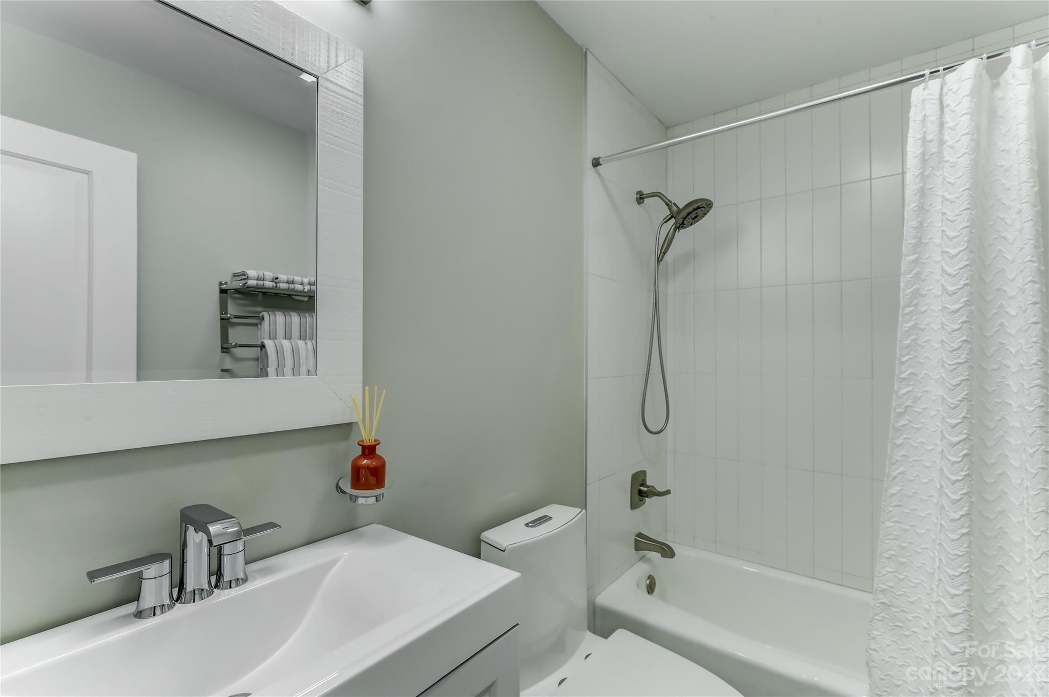 4308 Rosecliff Drive Charlotte, NC 28277 - Photo 29 of 39 a bathroom with a sink a toilet and shower