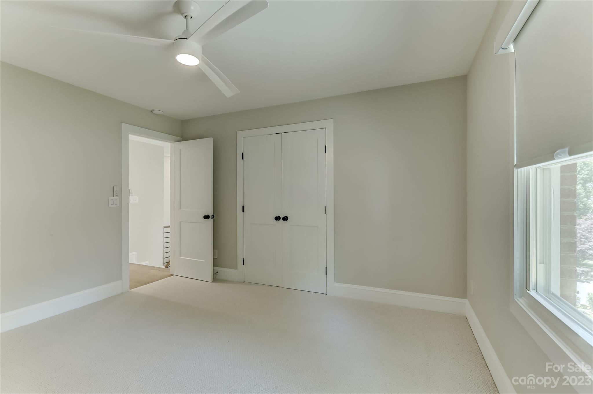 4308 Rosecliff Drive Charlotte, NC 28277 - Photo 31 of 39 an empty room with windows and outdoor view