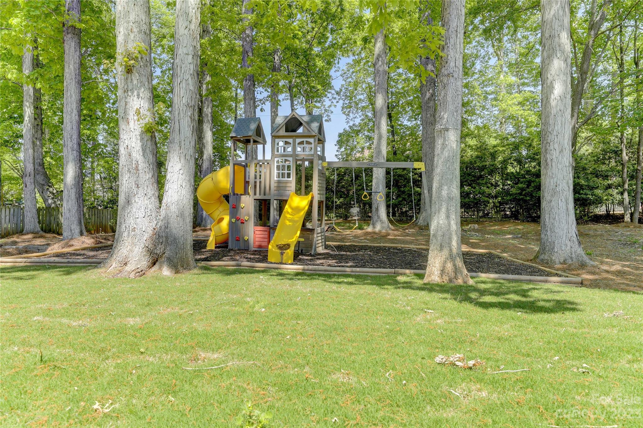 4308 Rosecliff Drive Charlotte, NC 28277 - Photo 38 of 39 a view of a park with swings and slides