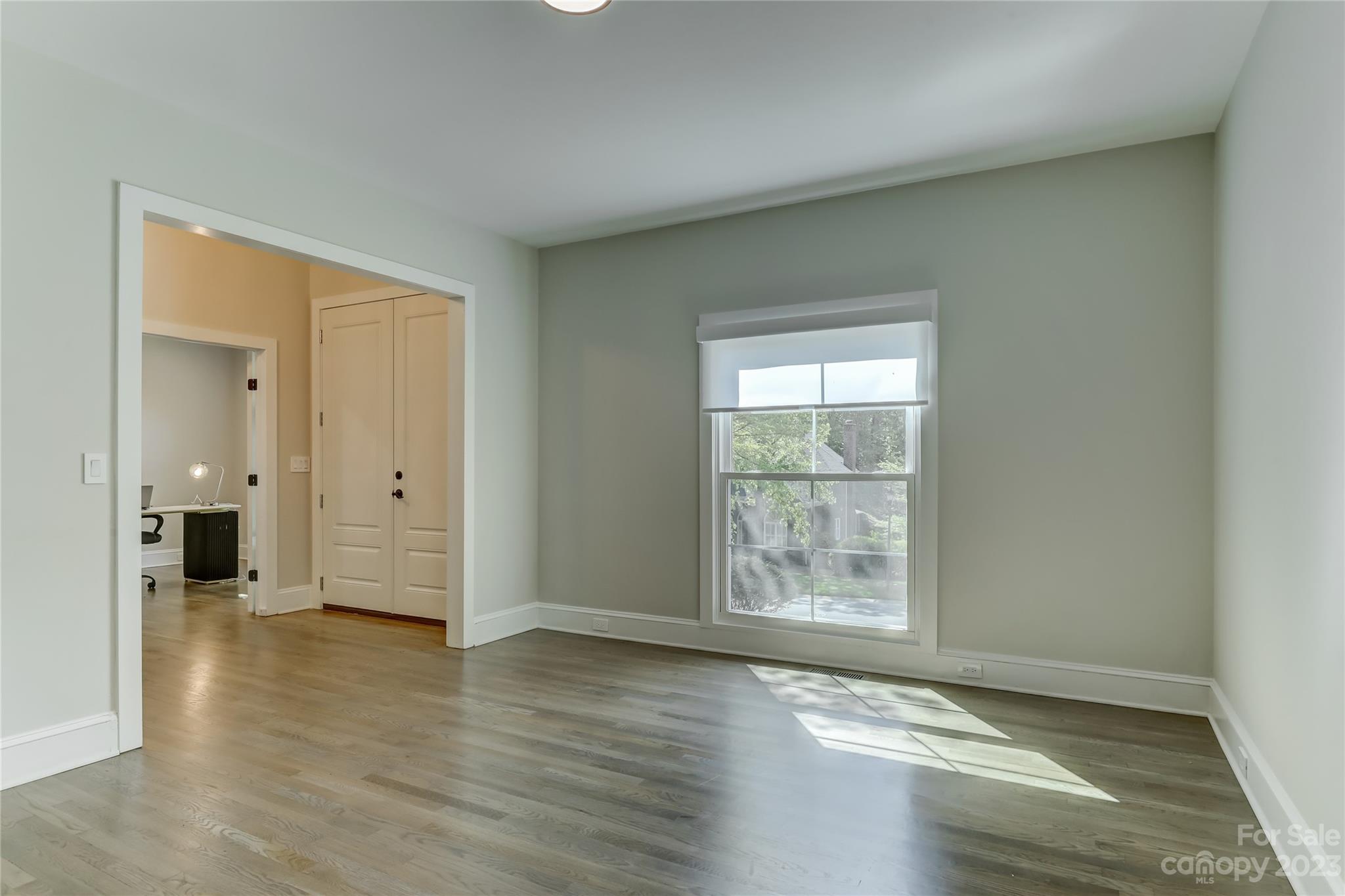 4308 Rosecliff Drive Charlotte, NC 28277 - Photo 8 of 39 an empty room with wooden floor and windows