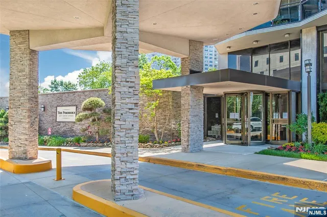 a front view of a house with a porch