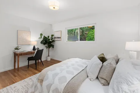 a bathroom with a sink toilet and a mirror