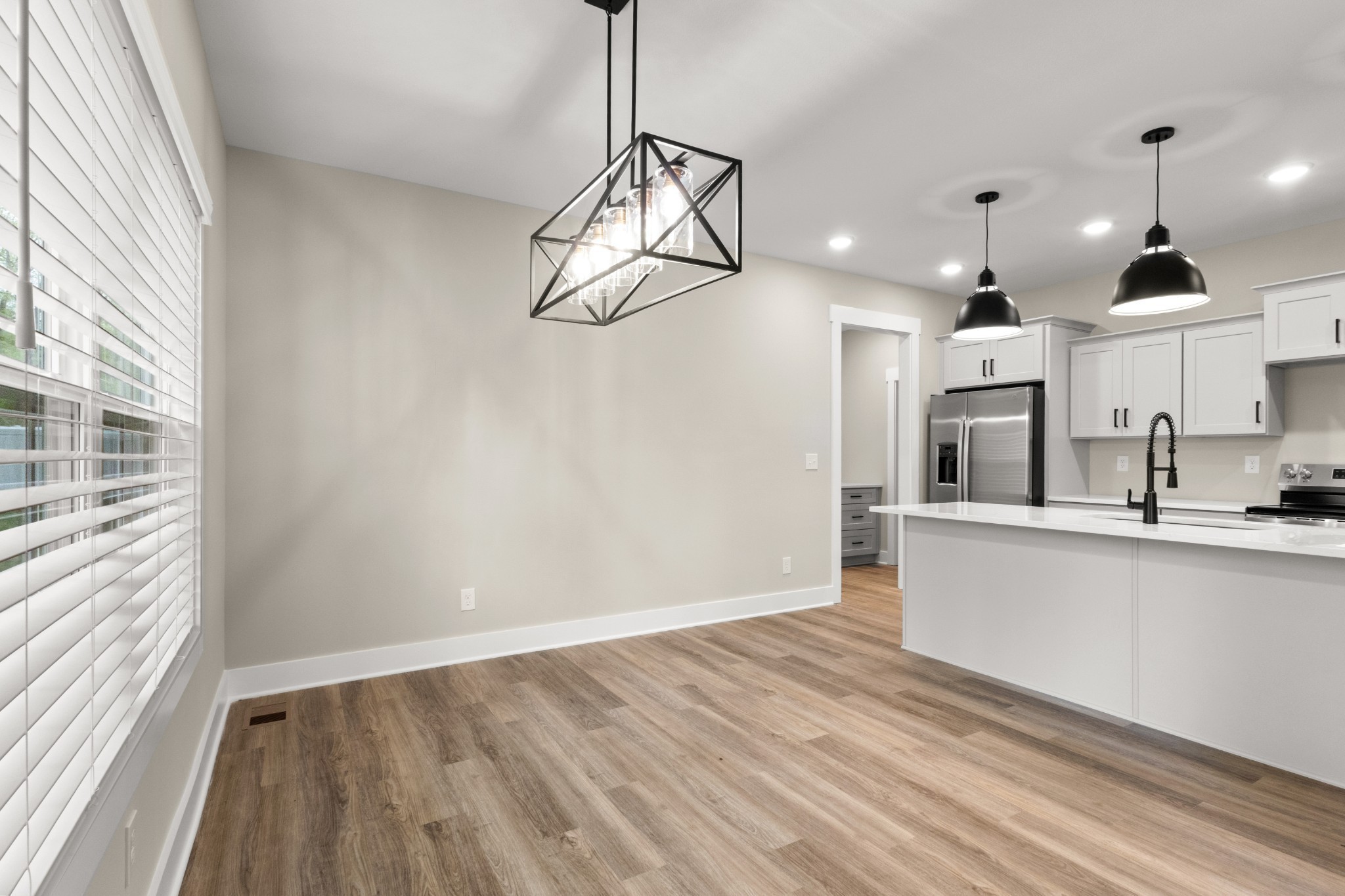 1169 Black Rock Road Clarksville, TN 37040 - Photo 24 of 40 a view of a kitchen with wooden floor and a window