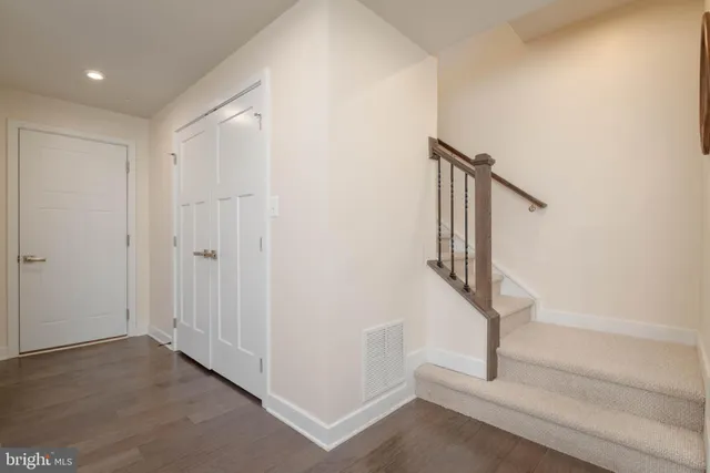 a view of a hallway with staircase