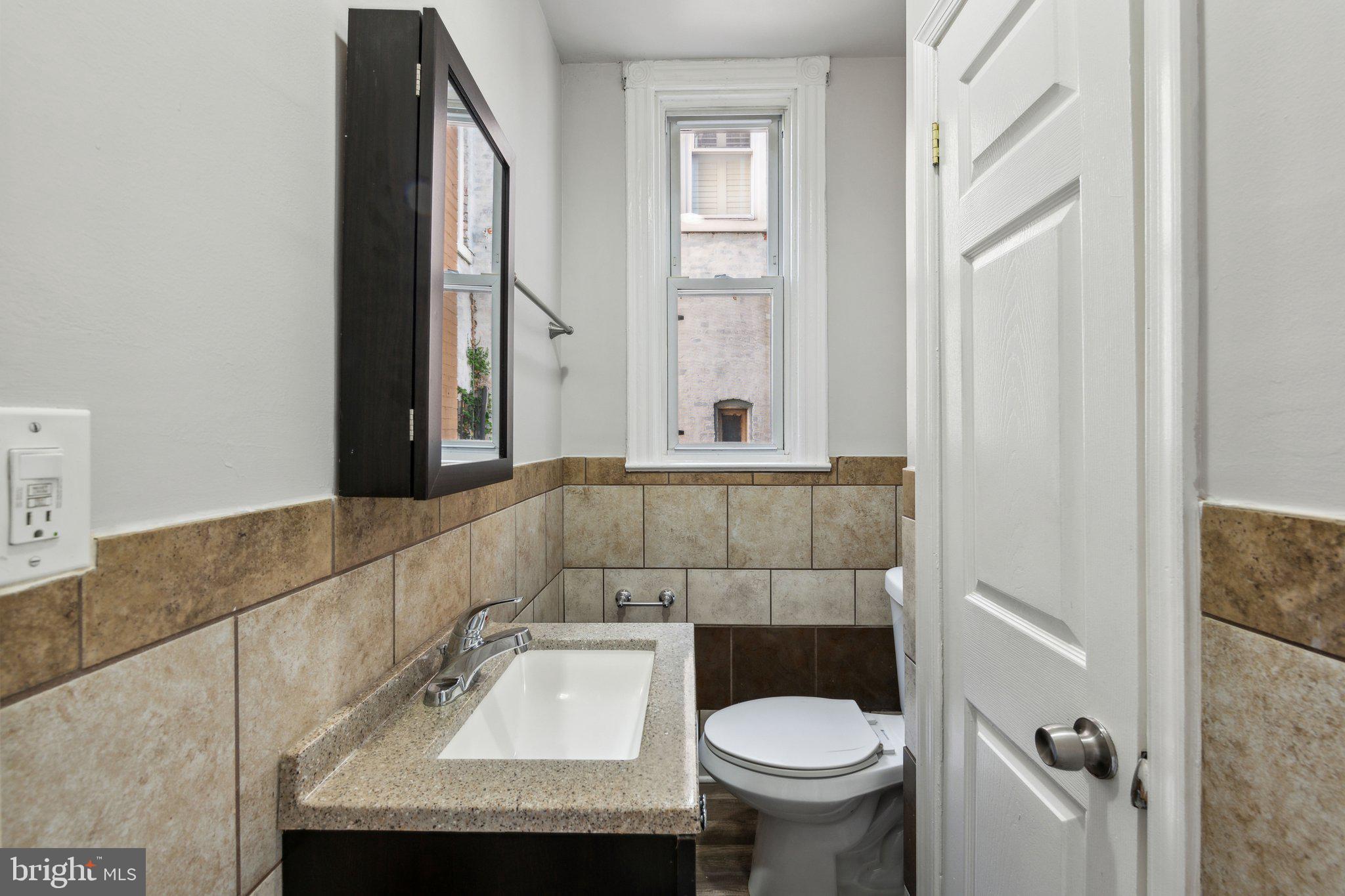 1306 E Street Northeast Washington, DC 20002 - Photo 7 of 35 1st floor powder room