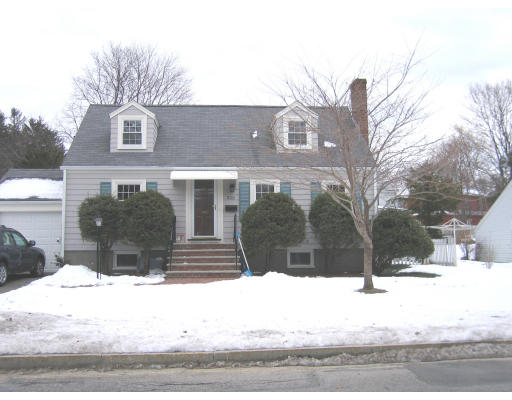 320 Appleton Street Arlington, MA 02476 - Photo 1 of 14 a front view of a house with a yard