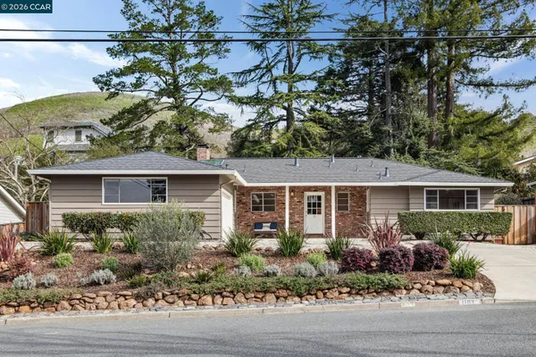 front view of house with a garden
