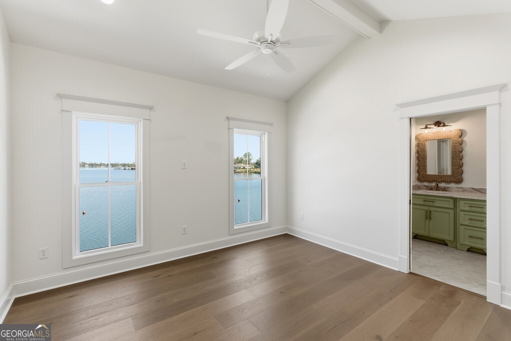 5909 Travis Trail Lake Park, GA 31636 - Photo 21 of 46 an empty room with a mirror and a sink