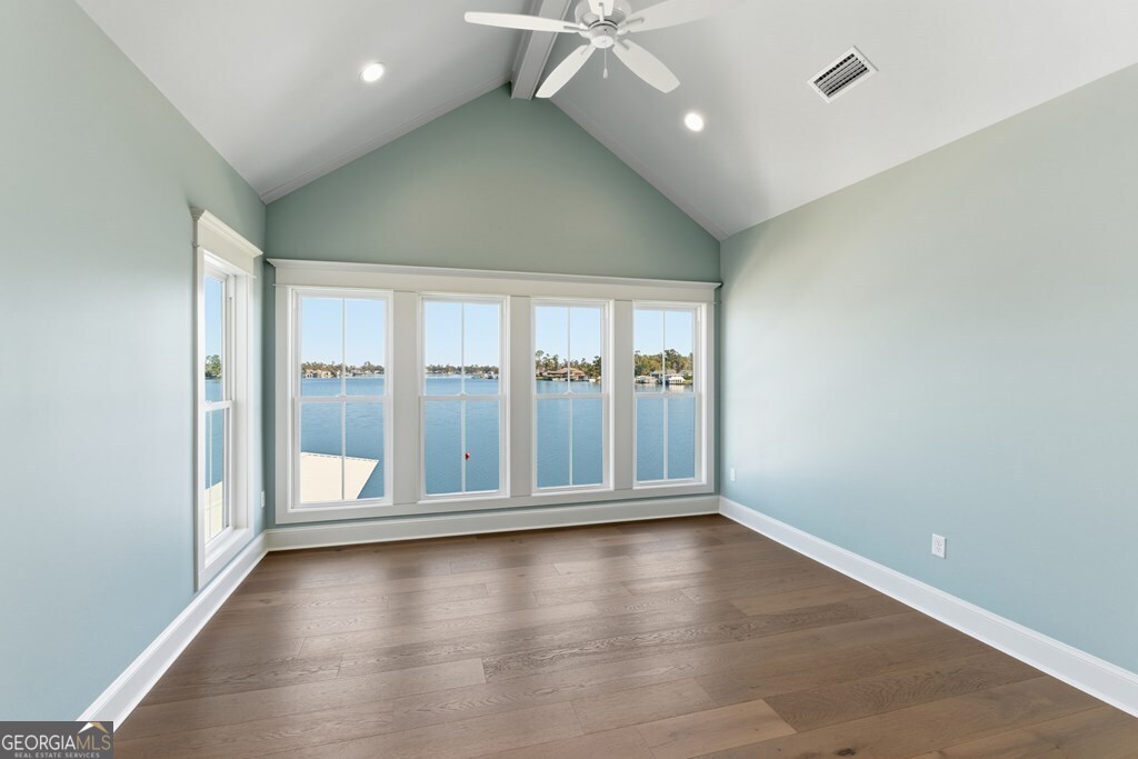5909 Travis Trail Lake Park, GA 31636 - Photo 23 of 46 wooden floor in an empty room with a window