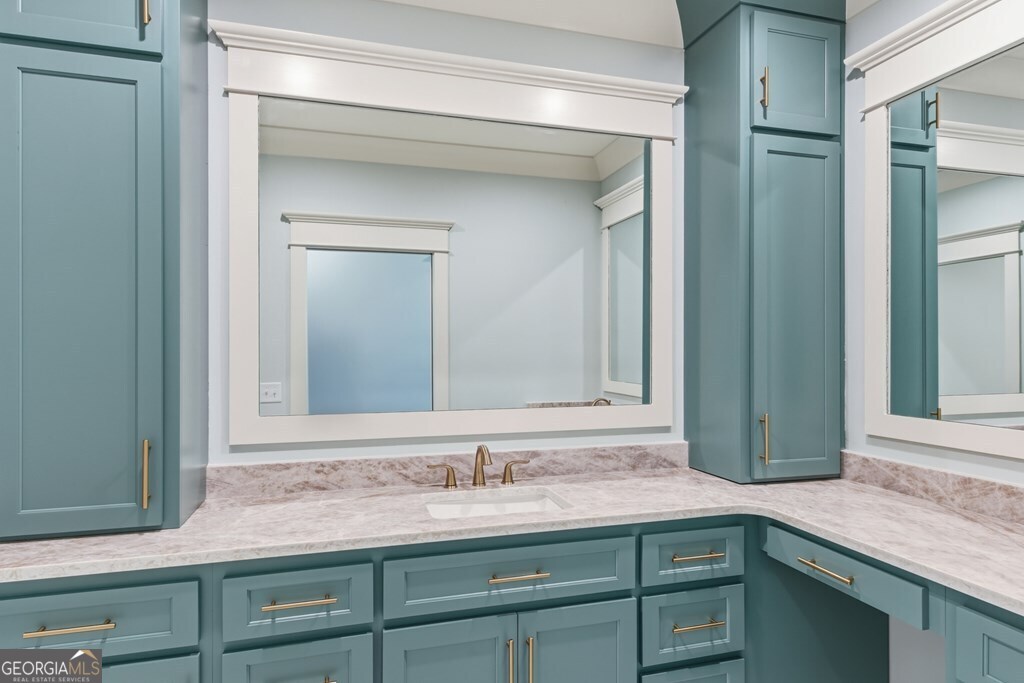 5909 Travis Trail Lake Park, GA 31636 - Photo 24 of 46 a bathroom with a sink and a mirror
