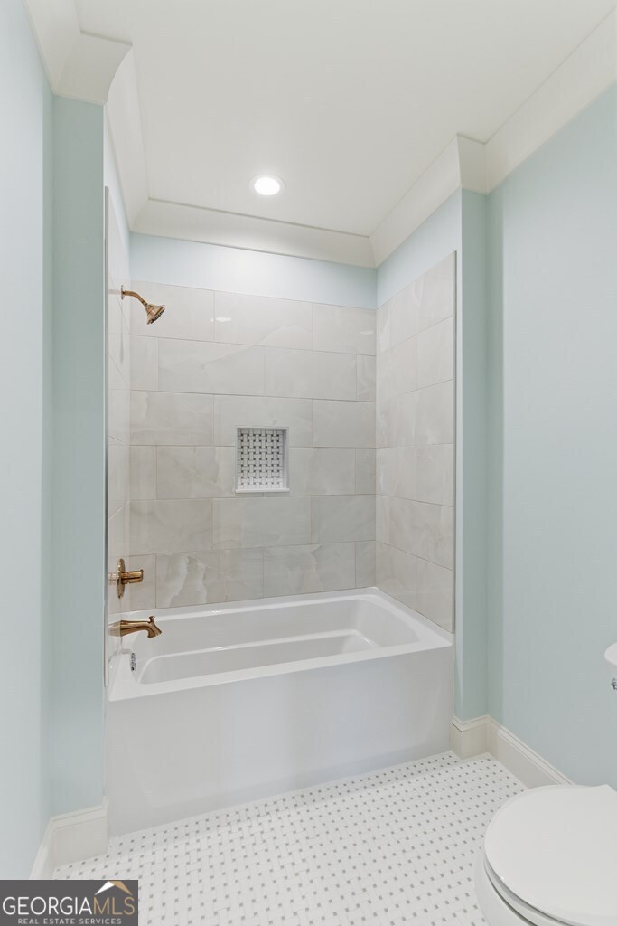 5909 Travis Trail Lake Park, GA 31636 - Photo 25 of 46 a bathroom with a bathtub and a shower