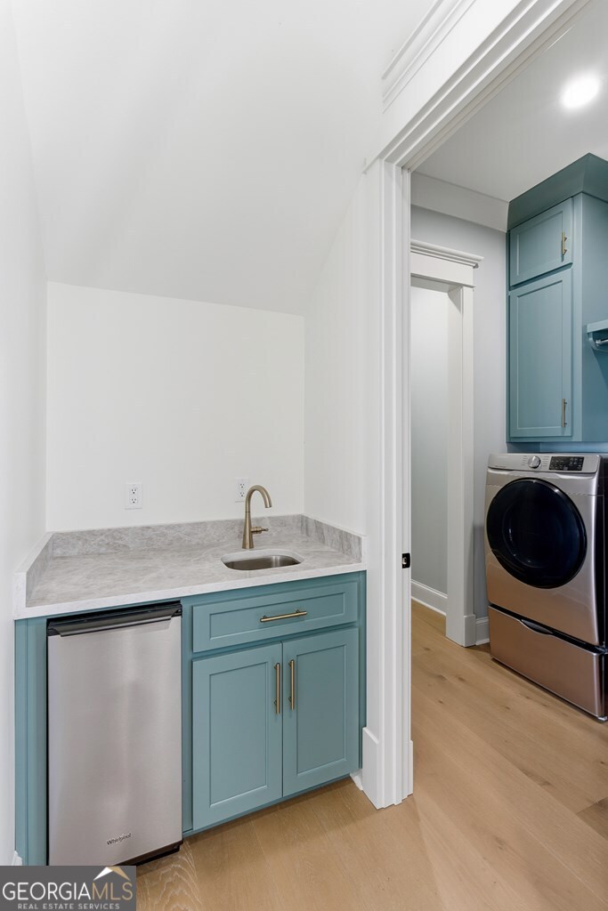 5909 Travis Trail Lake Park, GA 31636 - Photo 10 of 46 a utility room with sink dryer and washer