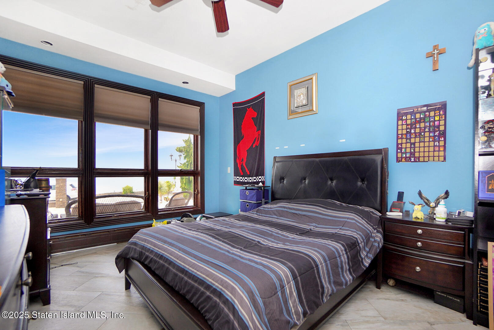 545 Arbutus Avenue Staten Island, NY 10312 - Photo 11 of 57 a bedroom with a bed and a large window