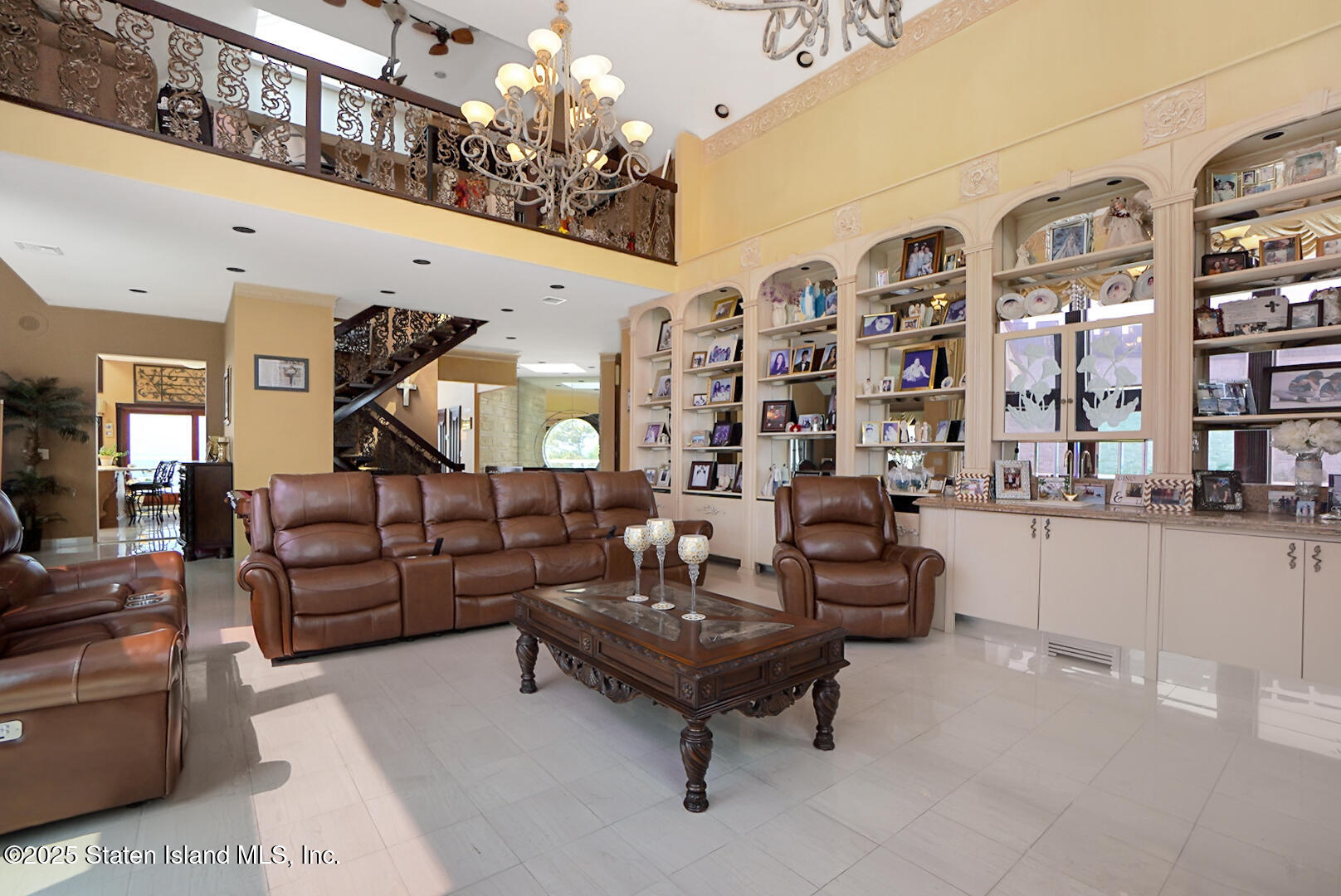 545 Arbutus Avenue Staten Island, NY 10312 - Photo 15 of 57 a living room with furniture and chandelier