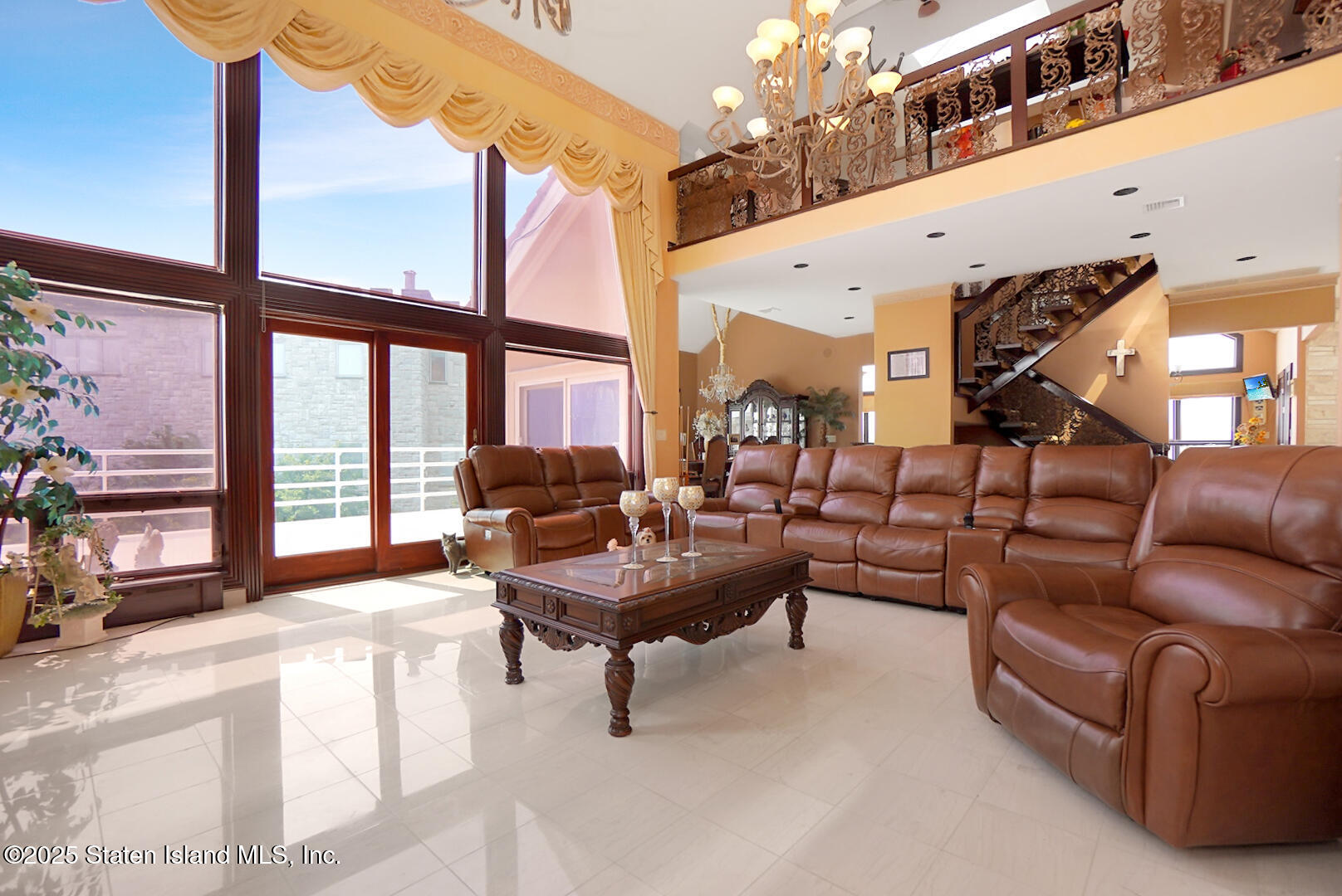 545 Arbutus Avenue Staten Island, NY 10312 - Photo 26 of 57 a living room with furniture and a large window
