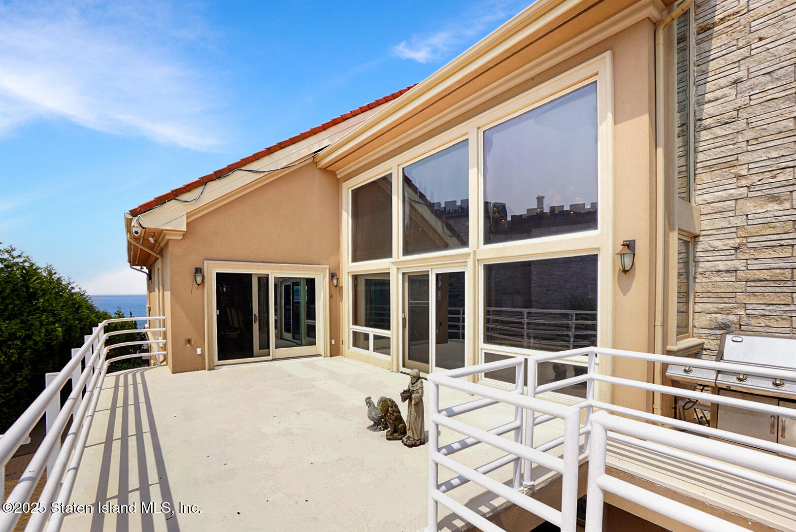 545 Arbutus Avenue Staten Island, NY 10312 - Photo 34 of 57 a view of a house with a patio
