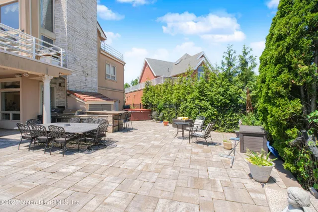 a view of a terrace with sitting area