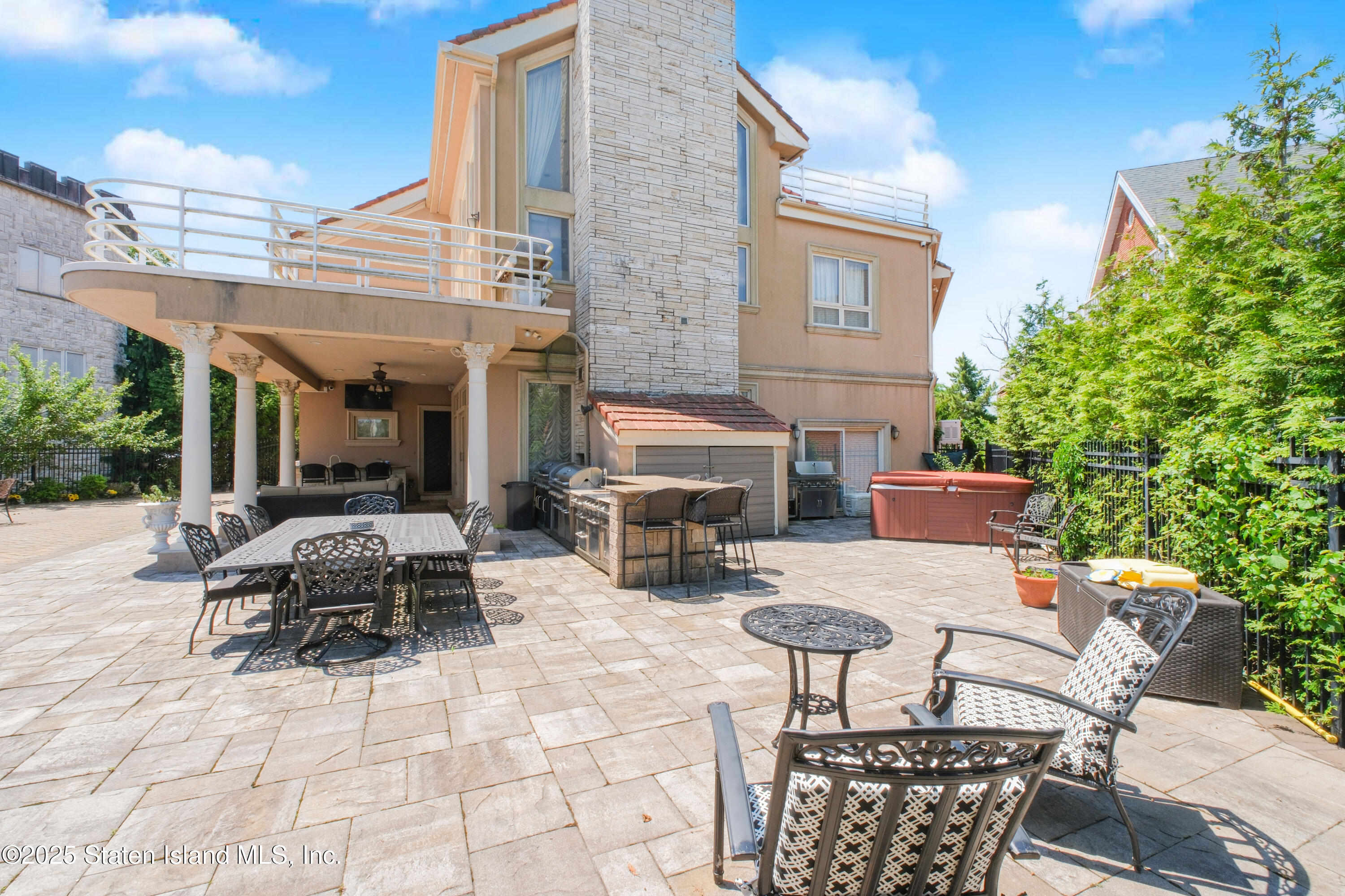 545 Arbutus Avenue Staten Island, NY 10312 - Photo 48 of 57 a building outdoor space with patio furniture and potted plants