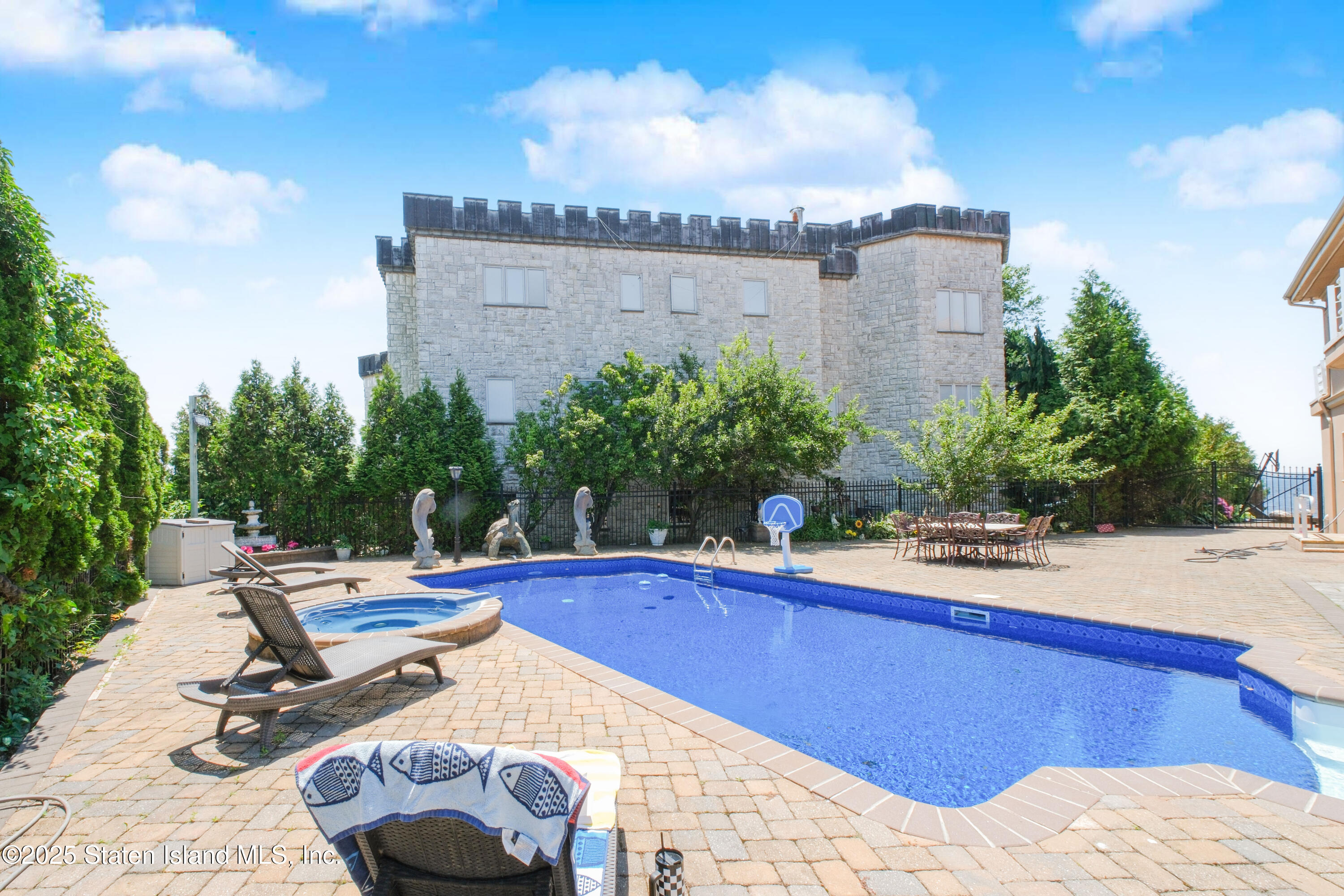 545 Arbutus Avenue Staten Island, NY 10312 - Photo 56 of 57 a view of a swimming pool with a patio