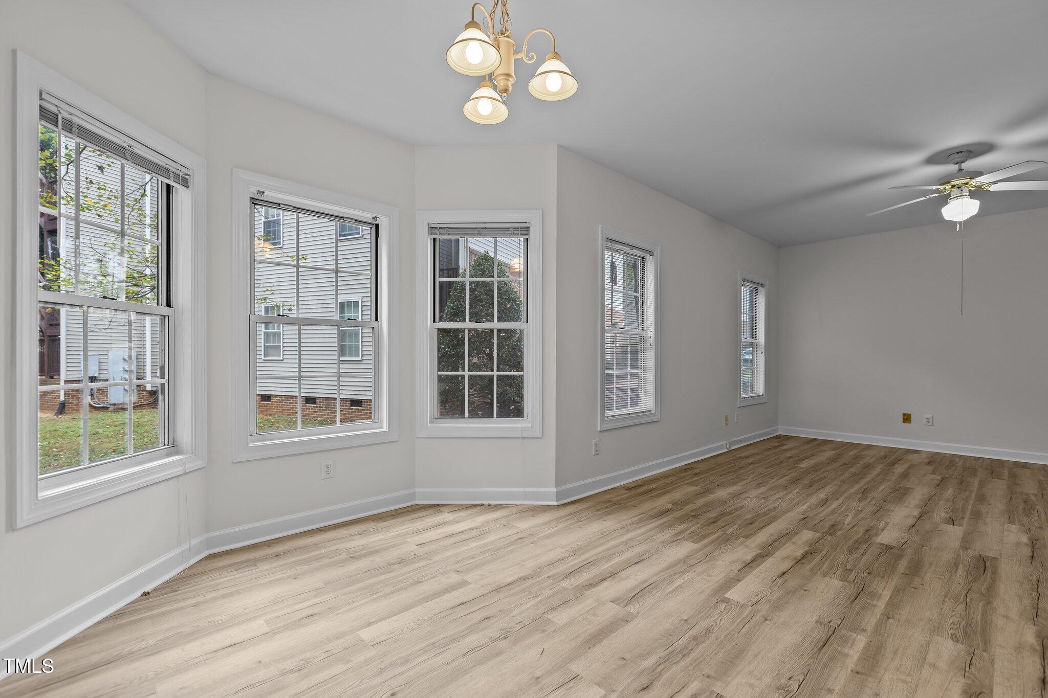 7022 Sandy Forks Road, Unit 101 Raleigh, NC 27615 - Photo 11 of 40 a view of an empty room with a window