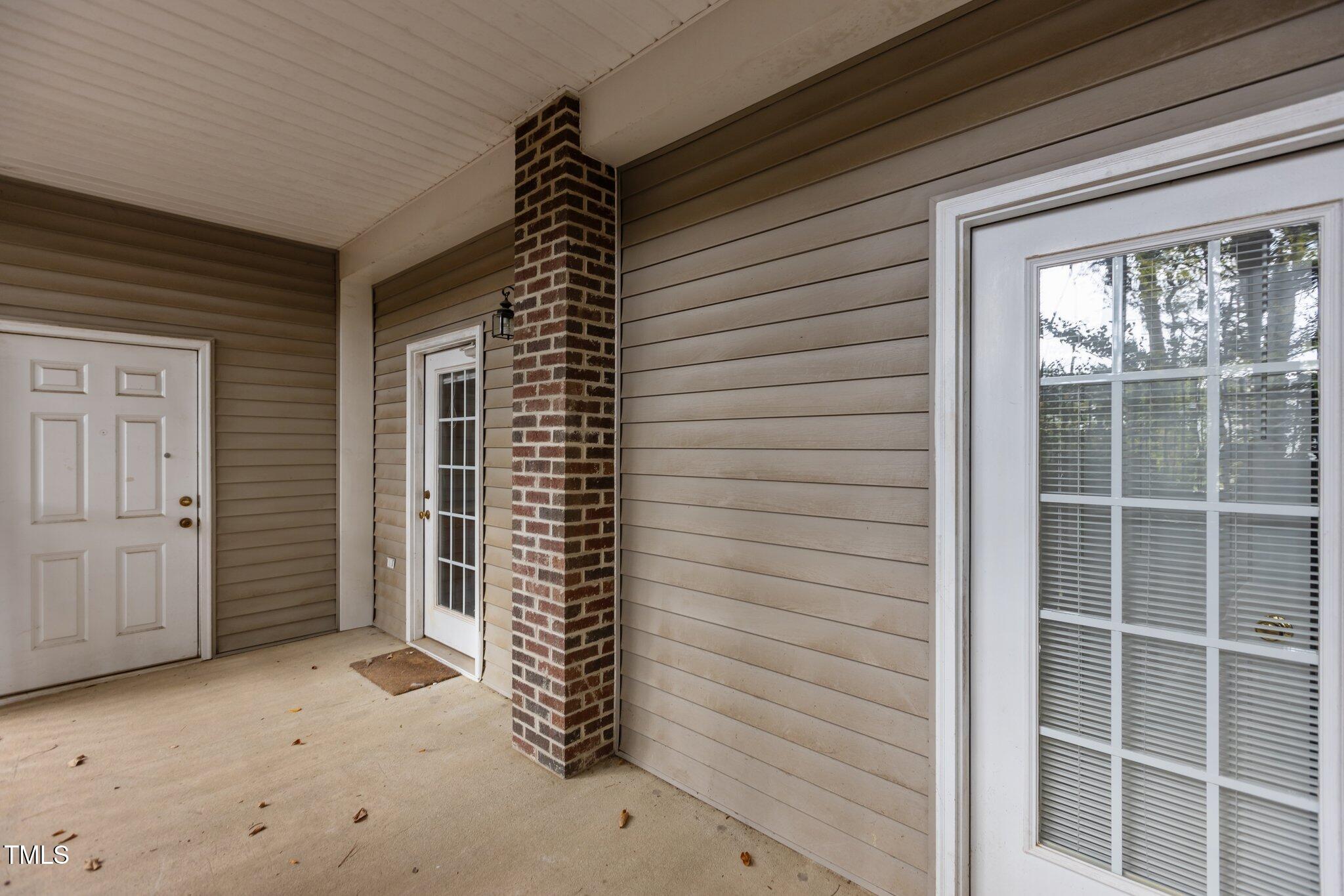 7022 Sandy Forks Road, Unit 101 Raleigh, NC 27615 - Photo 26 of 40 a view of entryway door