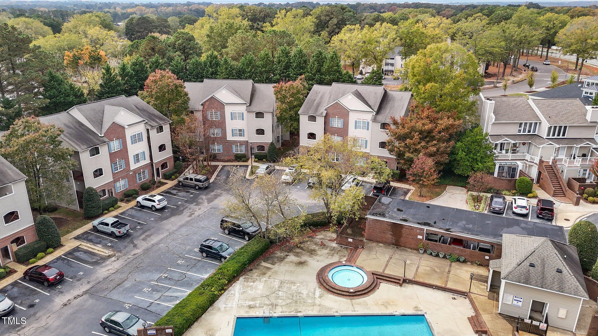 7022 Sandy Forks Road, Unit 101 Raleigh, NC 27615 - Photo 38 of 40 an aerial view of a house with outdoor space