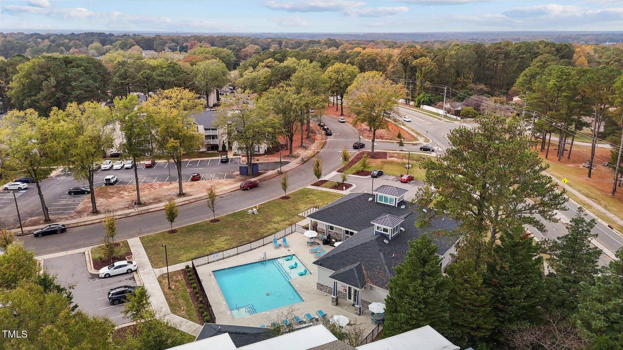 7022 Sandy Forks Road, Unit 101 Raleigh, NC 27615 - Photo 40 of 40 an aerial view of residential houses with outdoor space