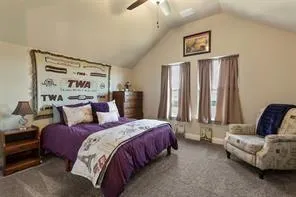 a bedroom with bed and window