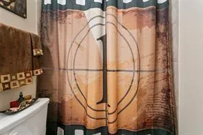 a view of a patio with table and chairs with potted plants