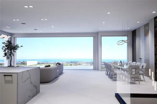 a dining room with furniture and wooden floor