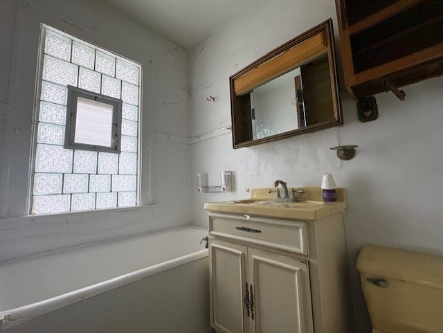 10607 South May Street Chicago, IL 60643 - Photo 8 of 15 a bathroom with a sink a vanity and a mirror
