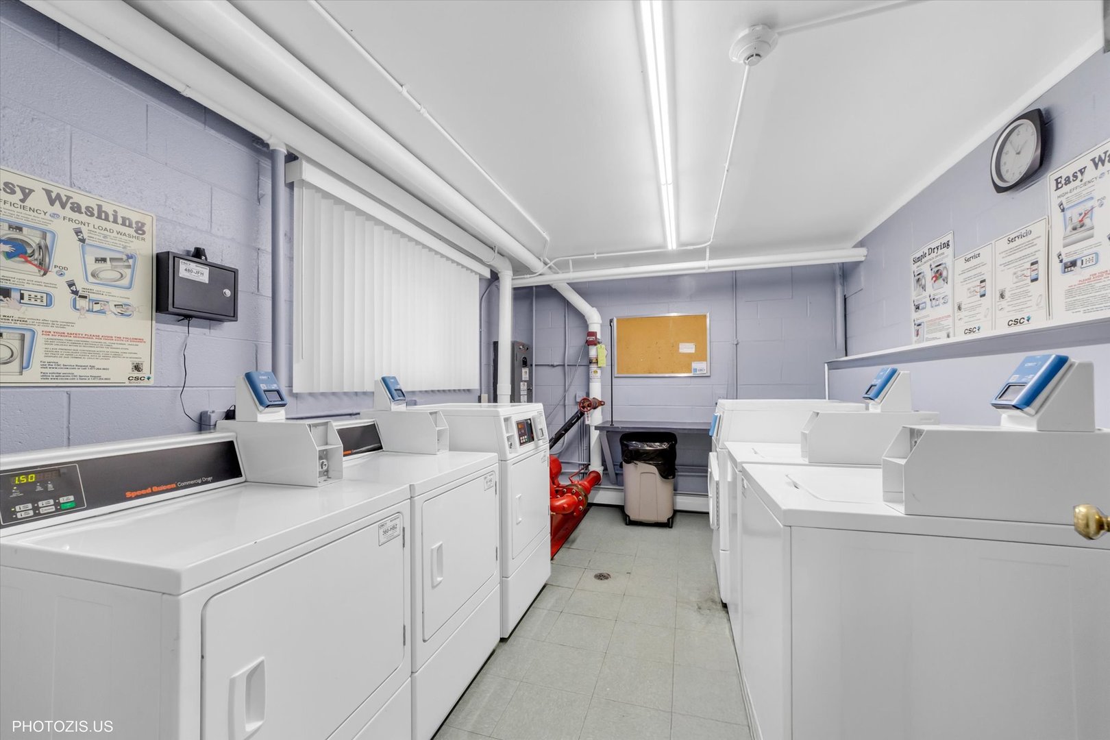 1126 South New Wilke Road, Unit 307 Arlington Heights, IL 60005 - Photo 22 of 37 a utility room with dryer and washer