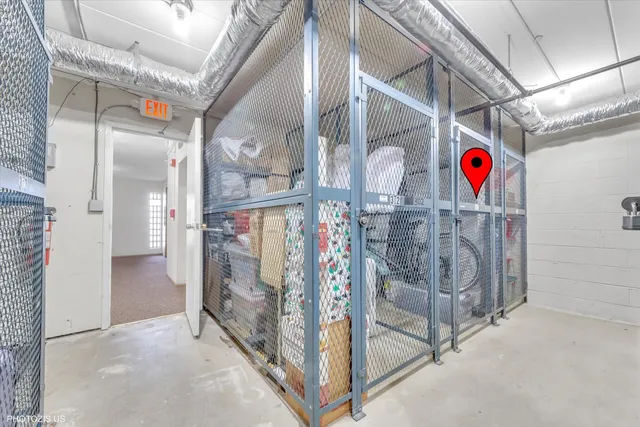 a view of water heater room with stairs