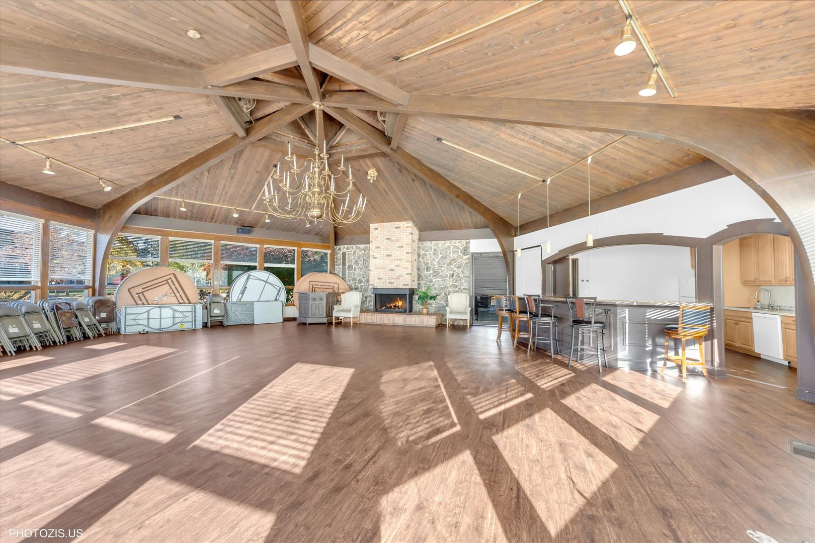 1126 South New Wilke Road, Unit 307 Arlington Heights, IL 60005 - Photo 26 of 37 a living room with lots of furniture and a large window