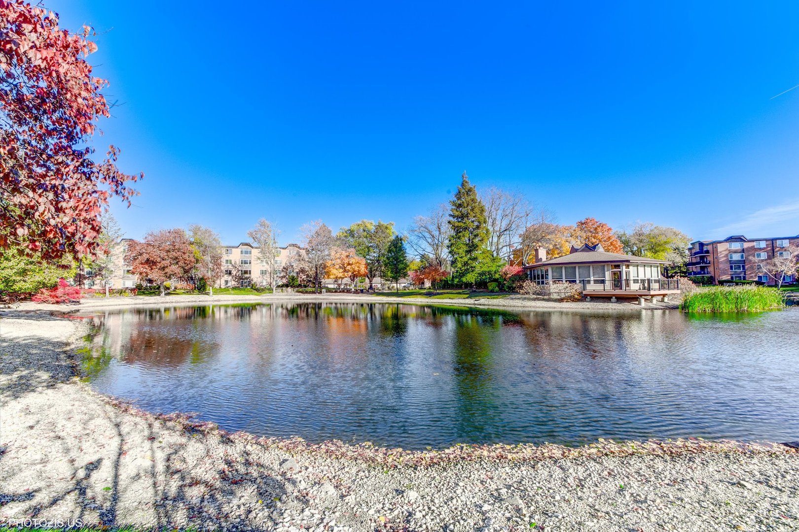 1126 South New Wilke Road, Unit 307 Arlington Heights, IL 60005 - Photo 30 of 37 a view of a lake with houses