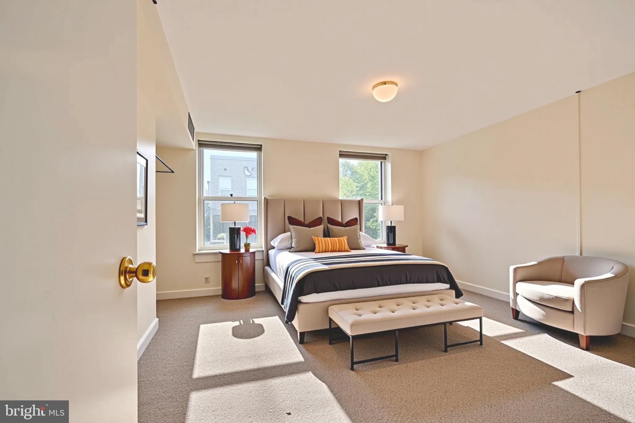 229 South Ann Street, Unit B Baltimore, MD 21231 - Photo 1 of 47 a bedroom with a bed and a couch