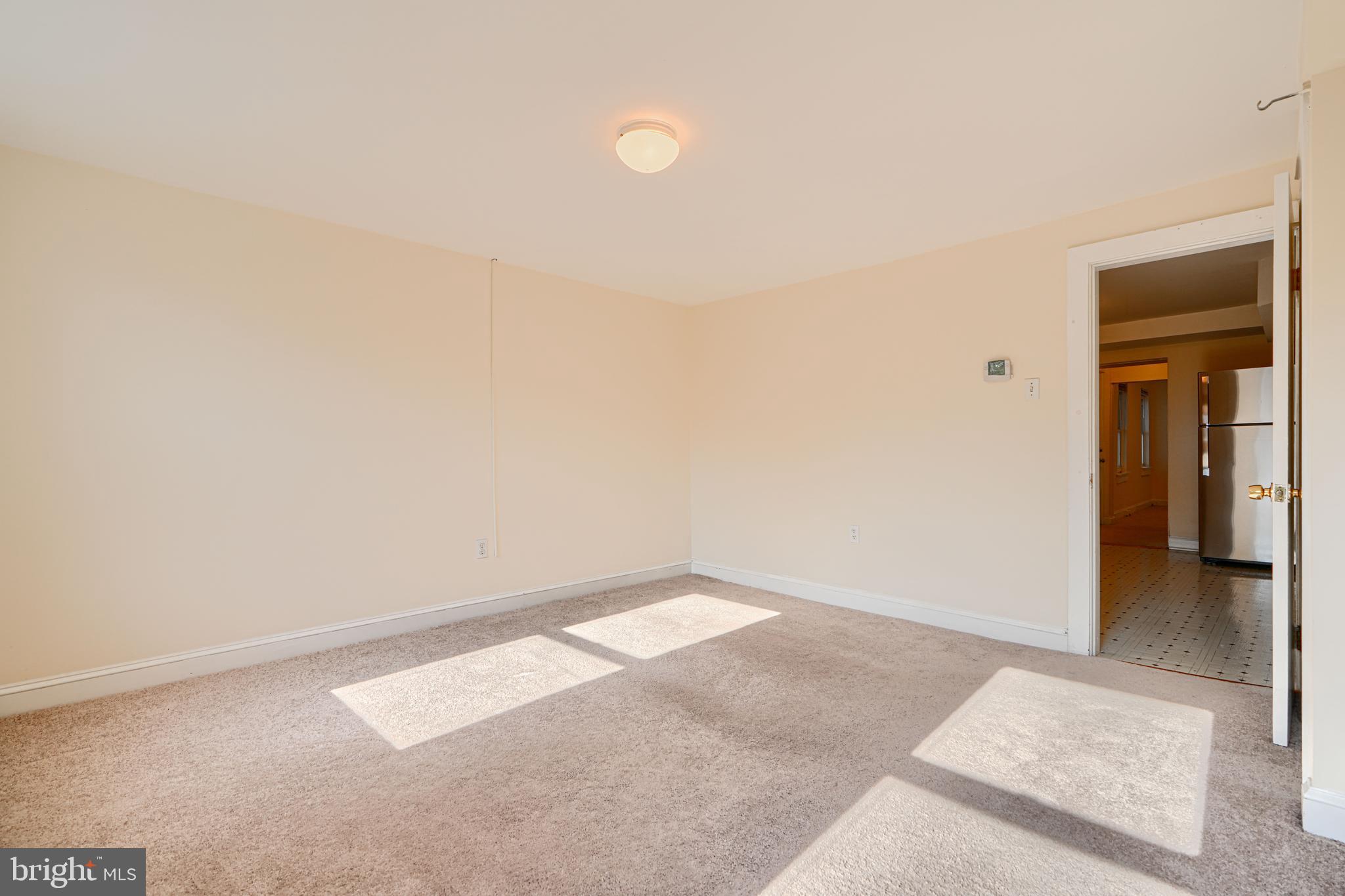229 South Ann Street, Unit B Baltimore, MD 21231 - Photo 12 of 47 a view of an empty room