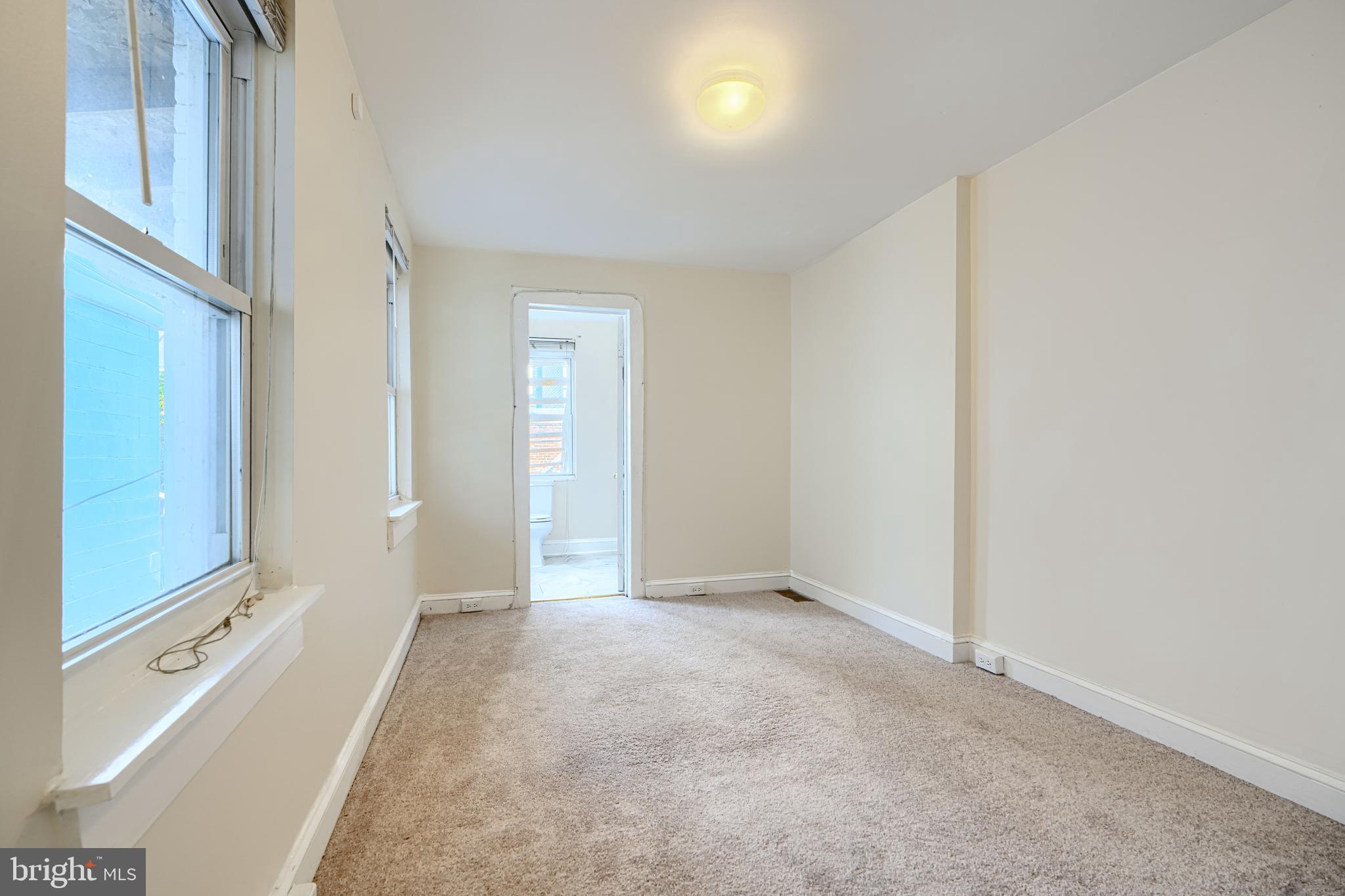 229 South Ann Street, Unit B Baltimore, MD 21231 - Photo 16 of 47 a view of an empty room