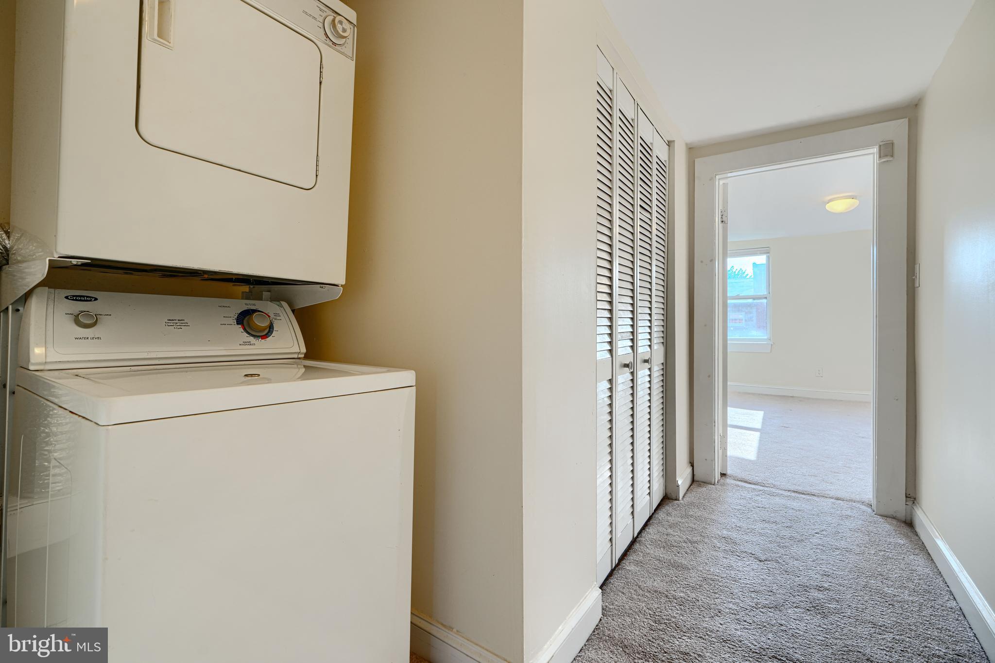 229 South Ann Street, Unit B Baltimore, MD 21231 - Photo 24 of 47 a view of utility room with washer and dryer