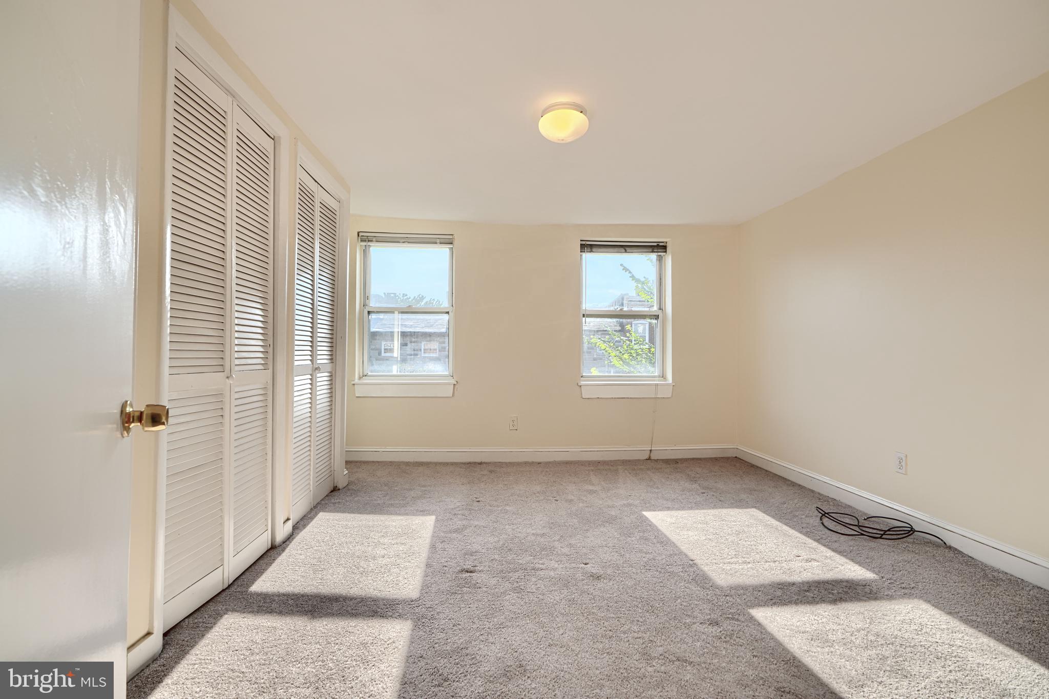 229 South Ann Street, Unit B Baltimore, MD 21231 - Photo 25 of 47 an empty room with windows