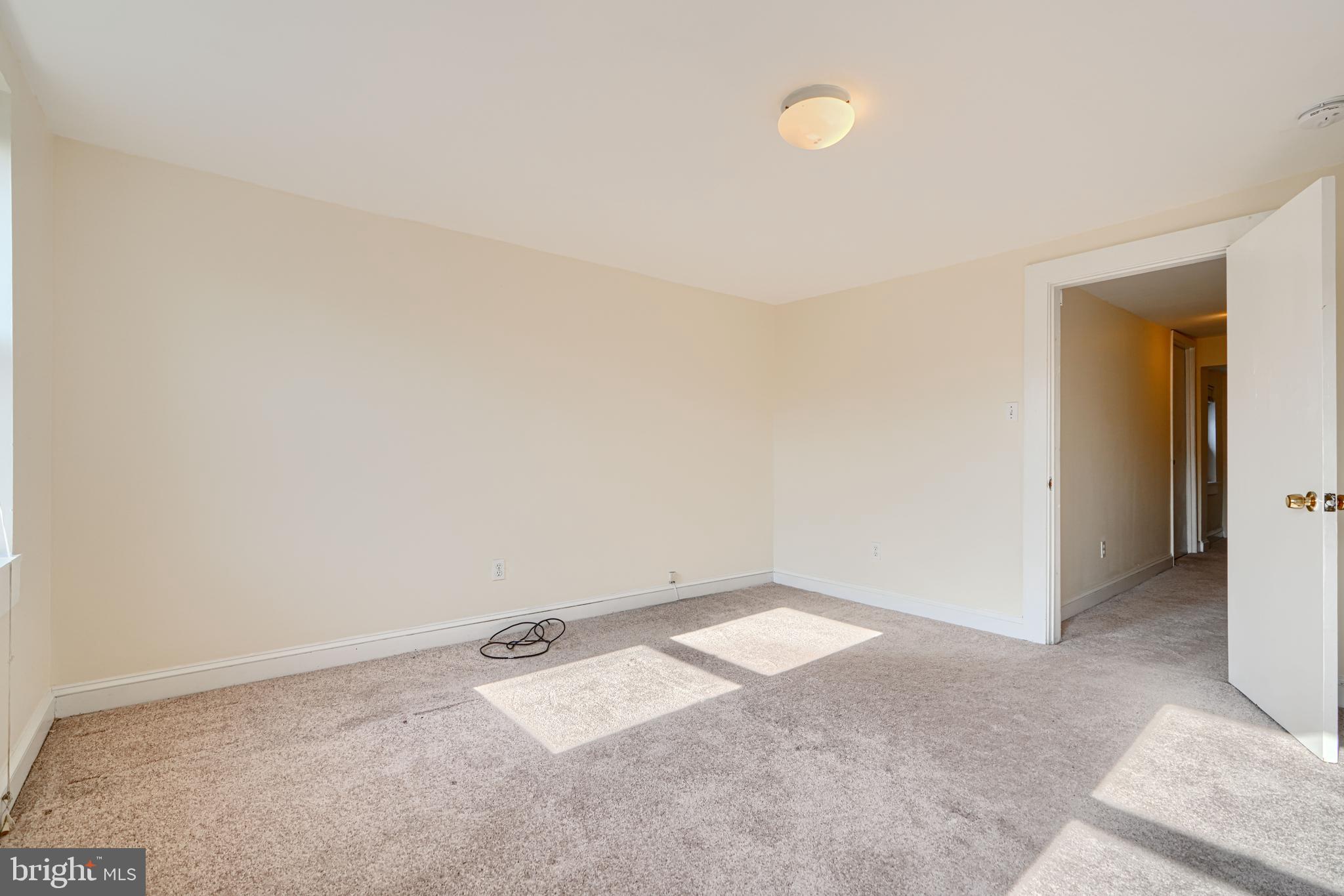 229 South Ann Street, Unit B Baltimore, MD 21231 - Photo 30 of 47 an empty room with an entryway