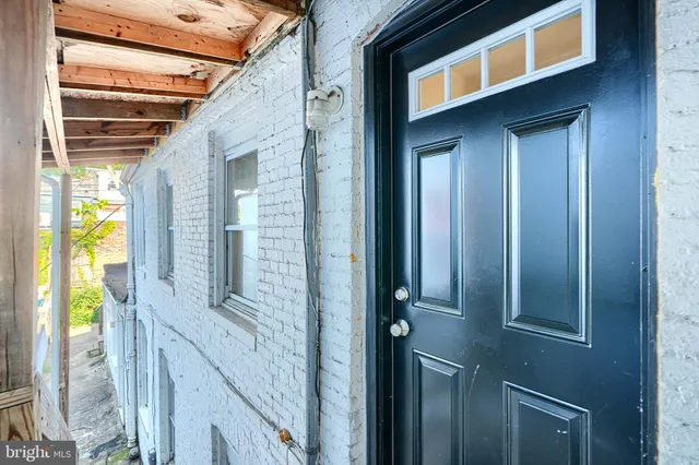 a view of a house with a walls