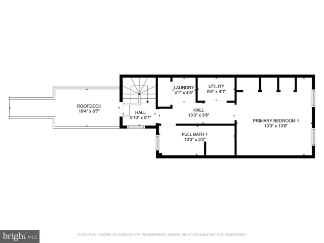a view of a balcony with wooden floor and outdoor seating